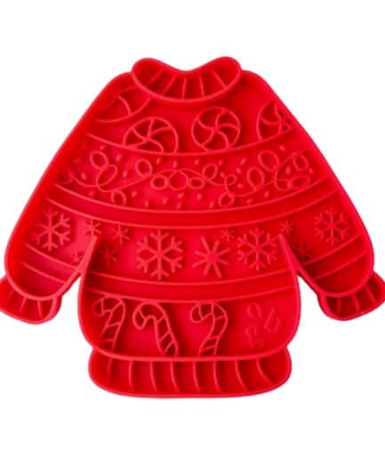 Tapis à lécher Ollie B. Good en silicone alimentaire rouge, forme pull de Noël, avec ventouses antidérapantes