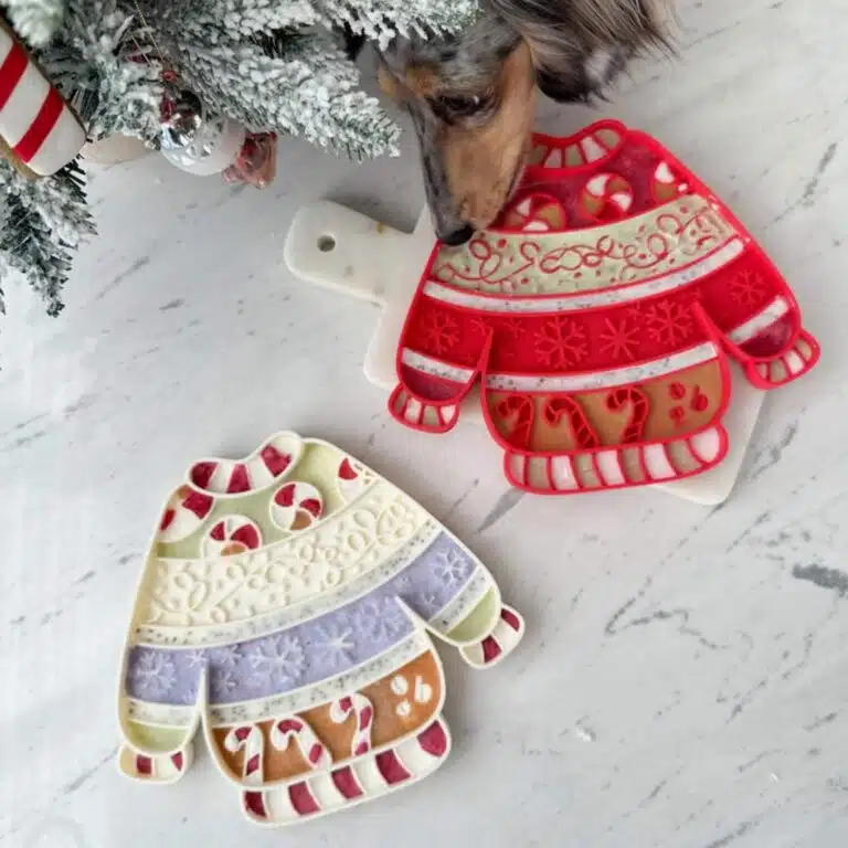 Chien léchant le tapis Ollie B. Good avec concentration, moment de détente et stimulation mentale.